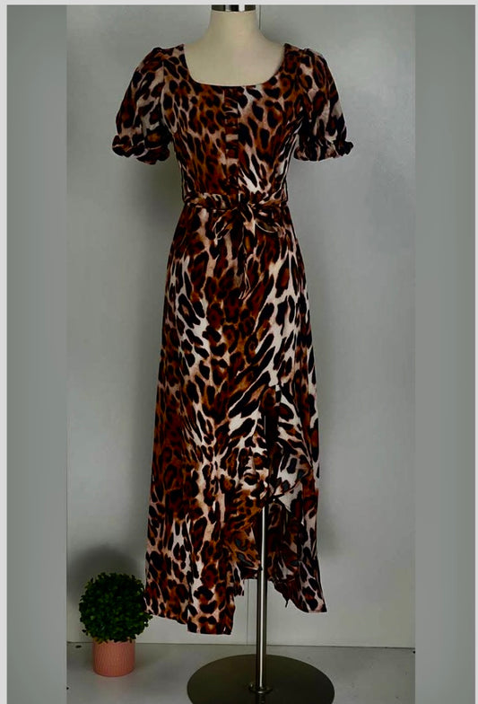 Leopard print dress on a mannequin against a plain background