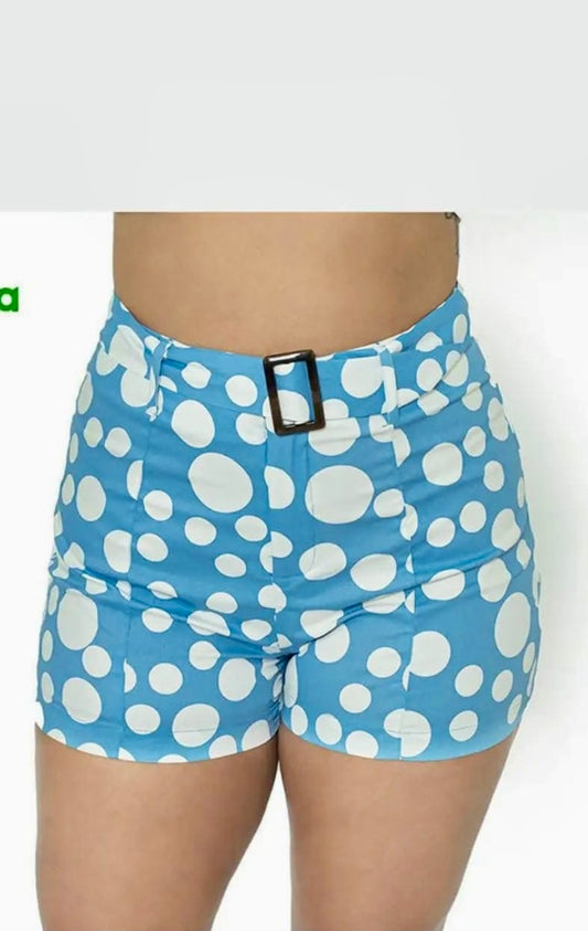 Blue shorts with white polka dots on a white background